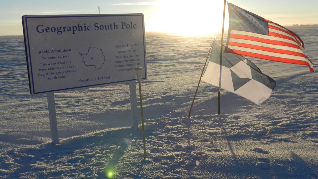 <strong>Geographic South Pole:</strong> Townsend photographed the True South flag alongside the US flag.