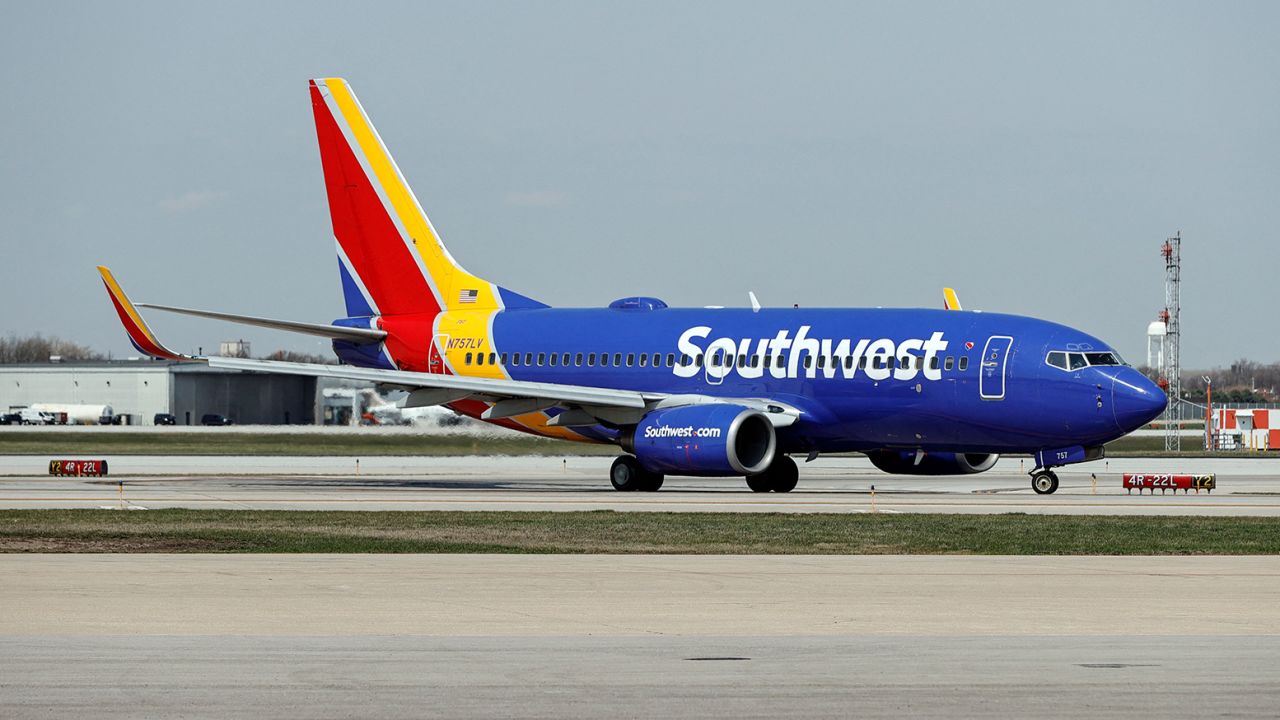 A Southwest Airlines Boeing 737-7H4 jet taxis to the gate after landing at Midway International Airport in Chicago, Illinois, on April 6, 2021. (Photo by KAMIL KRZACZYNSKI / AFP) (Photo by KAMIL KRZACZYNSKI/AFP via Getty Images)