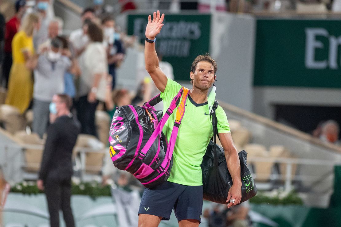 Rafael Nadal waves to the crowd after his French Open semifinal defeat to Novak Djokovic.