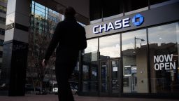A pedestrian walks past a JPMorgan Chase bank branch in Washington, D.C., U.S., on Thursday, Jan. 7, 2021.