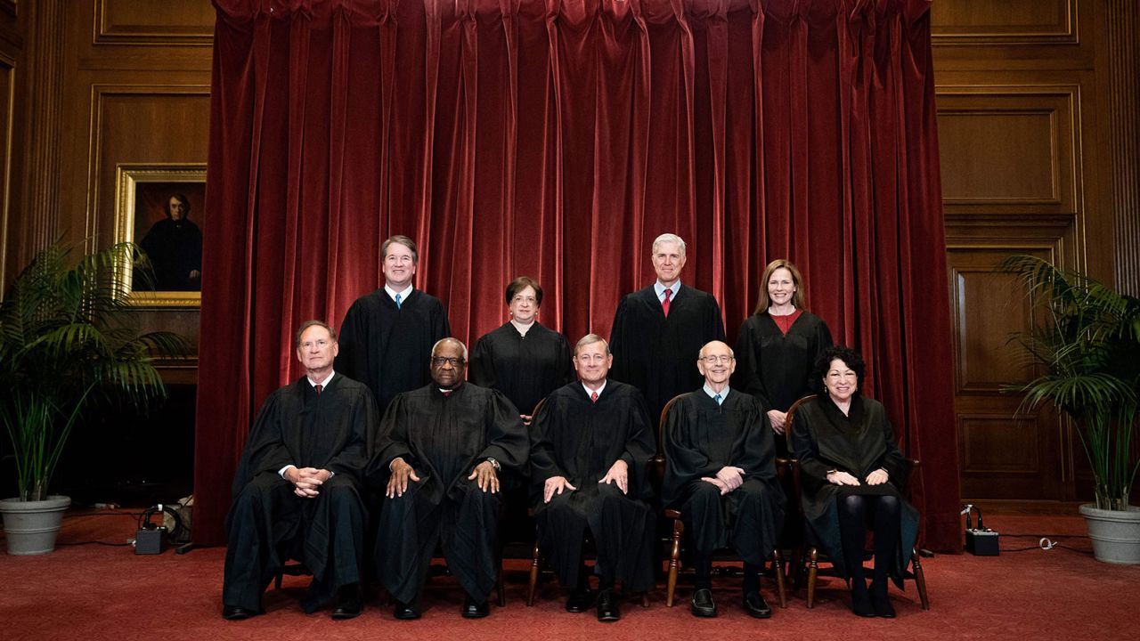 Seated from left: Associate Justice Samuel Alito, Associate Justice Clarence Thomas, Chief Justice John Roberts, Associate Justice Stephen Breyer and Associate Justice Sonia Sotomayor, standing from left: Associate Justice Brett Kavanaugh, Associate Justice Elena Kagan, Associate Justice Neil Gorsuch and Associate Justice Amy Coney Barrett pose during a group photo of the Justices at the Supreme Court in Washington, DC on April 23, 2021. (Photo by Erin Schaff / POOL / AFP) (Photo by ERIN SCHAFF/POOL/AFP via Getty Images)