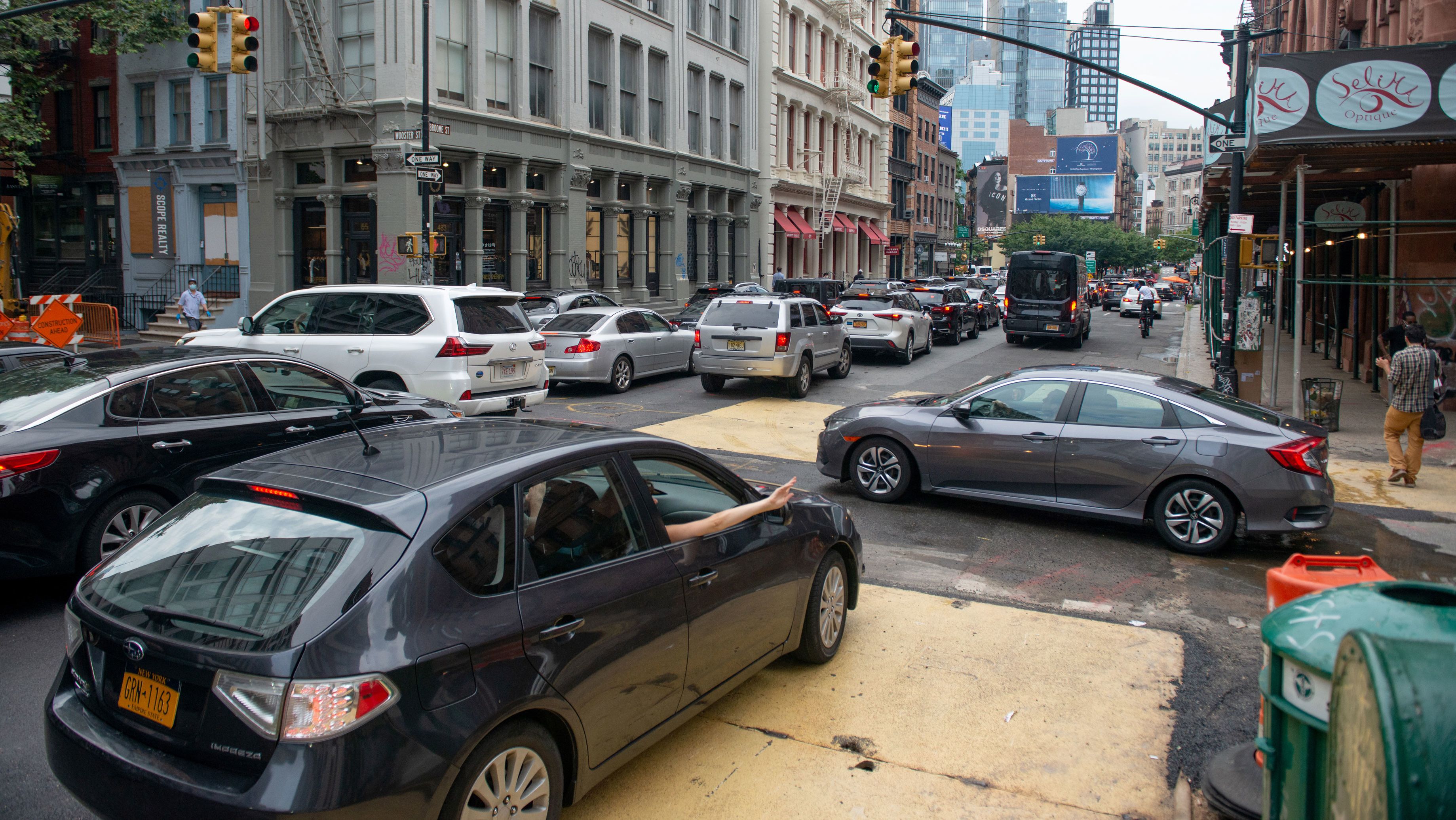 Cars crowd an intersection in the SoHo neighborhood of New York City on August 7, 2020.