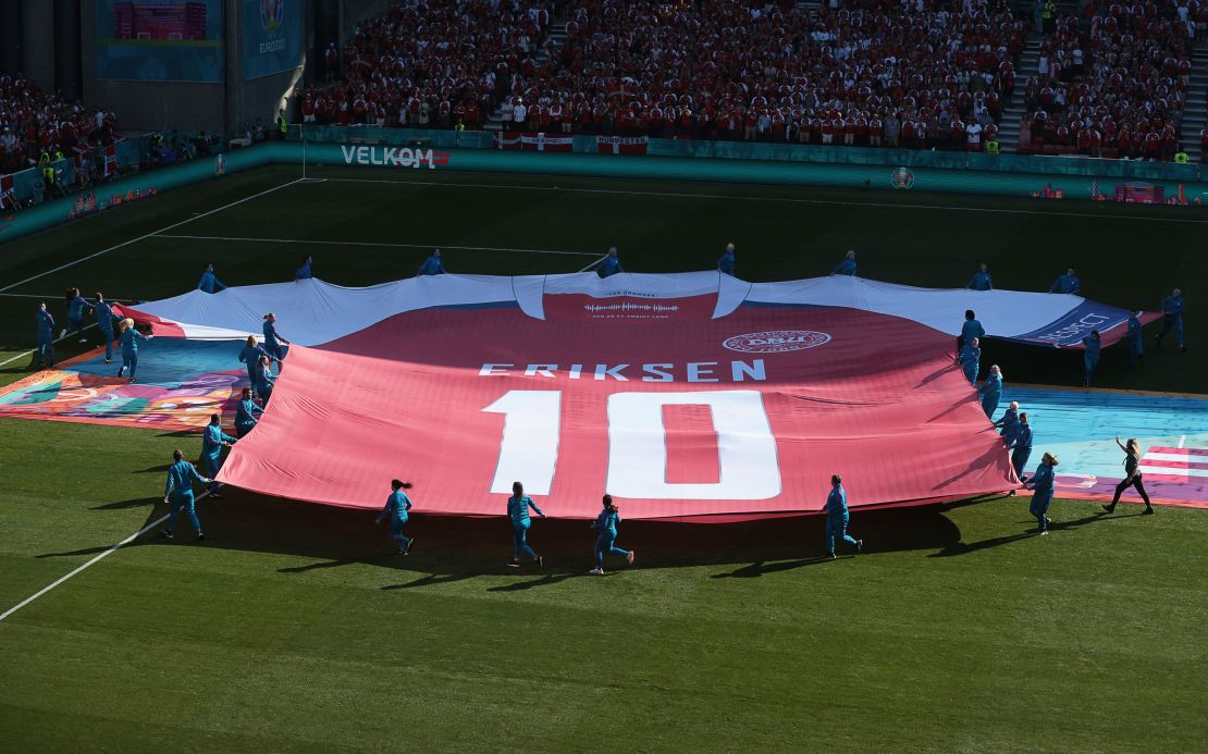 A giant jersey of Denmark's midfielder Christian Eriksen is put on display on Thursday. 
