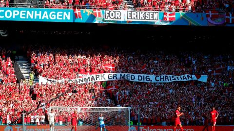A banner of support was raised as those inside the stadium paid tribute.