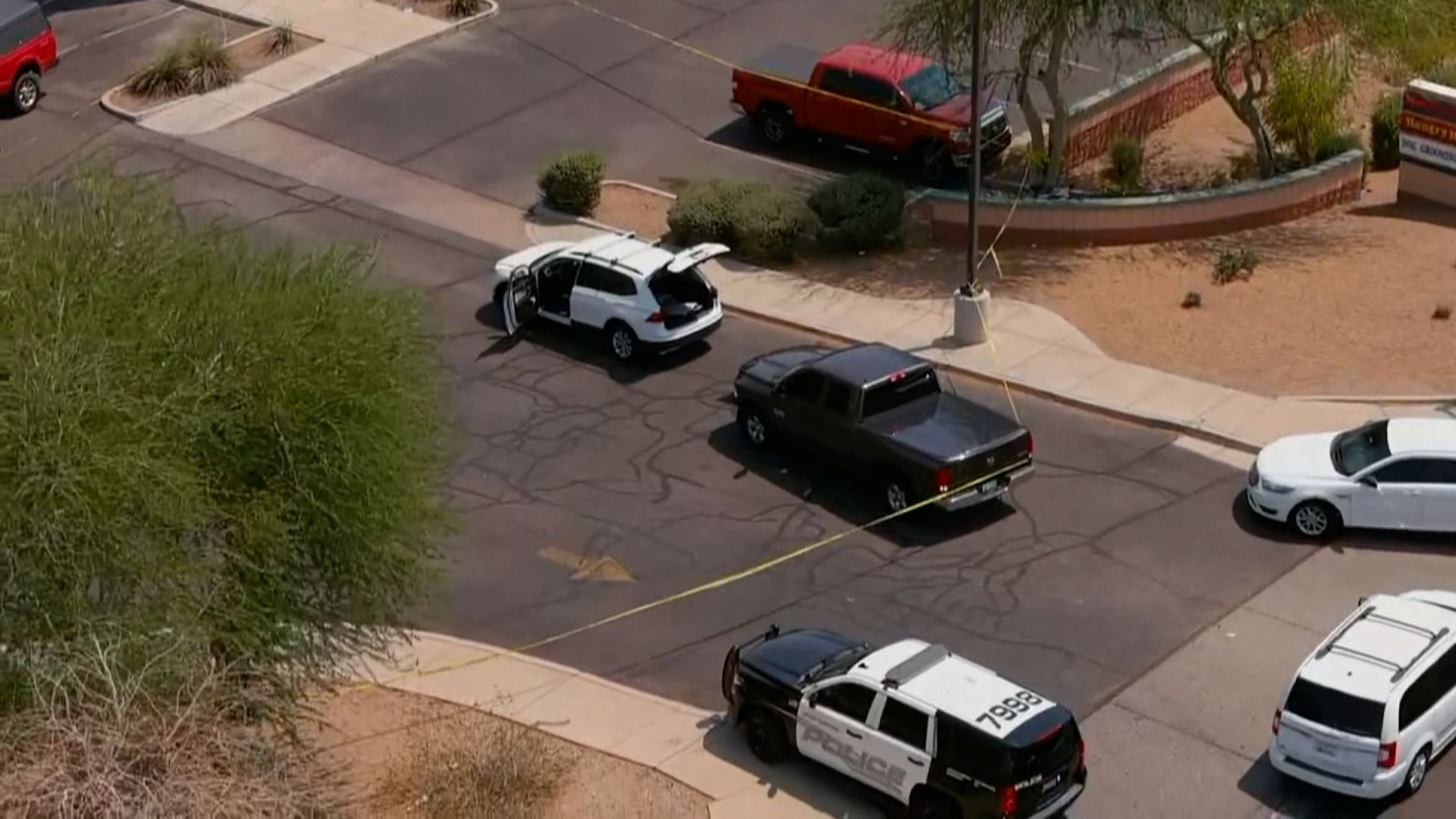 CNN affiliate KPHO/KTVK aerial video shows a white SUV the station reported was the suspect's vehicle. 