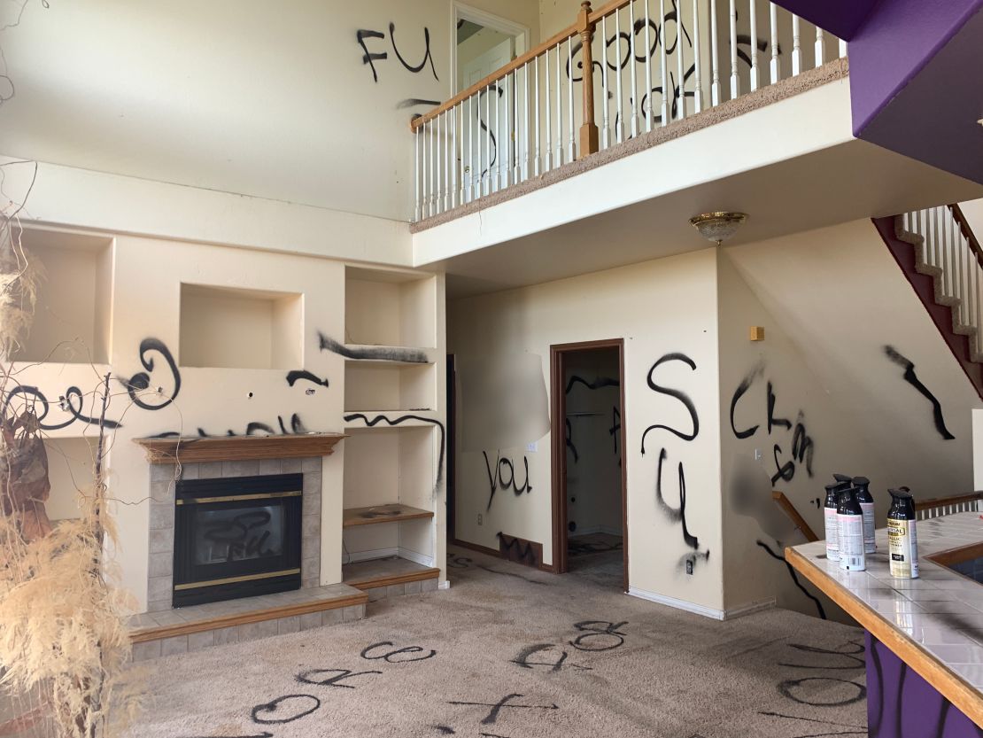 Most surfaces in this Colorado home have black spray paint. CNN has blurred portions of this image. 