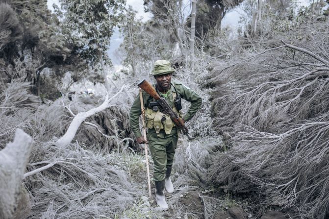 A ranger from the Virunga National Park climbs the slopes of the Mount Nyiragongo volcano, north of Goma in the Democratic Republic of Congo, on Friday, June 11. <a href="https://www.cnn.com/2021/05/27/africa/gallery/volcano-eruption-democratic-republic-of-congo/index.html" target="_blank">The volcano erupted last month,</a> killing at least 31 people and forcing thousands to flee their homes.