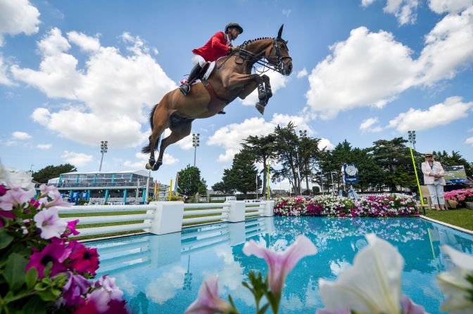 Steve Guerdat rides Albfuehern's Maddox to victory Friday, June 11, during a Nations Cup jumping event in La Baule, France.