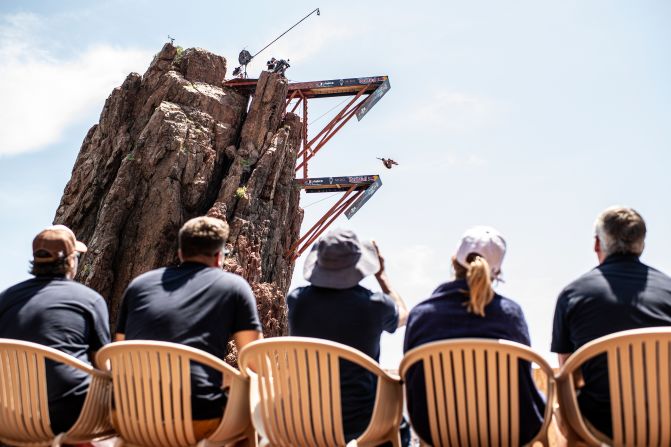Judges watch Colombian diver Maria Paula Quintero compete in a Red Bull Cliff Diving World Series event in Saint-Raphael, France, on Saturday, June 12.