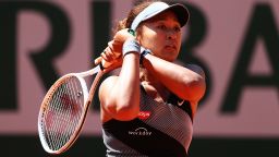 PARIS, FRANCE - MAY 30: Naomi Osaka of Japan plays a backhand in her First Round match against Patricia Maria Tig of Romania during Day One of the 2021 French Open at Roland Garros on May 30, 2021 in Paris, France. (Photo by Julian Finney/Getty Images)