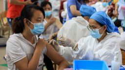 This photo taken on June 3, 2021 shows a resident receiving a Sinovac Covid-19 coronavirus vaccine in Rongan, in China's southern Guangxi region.