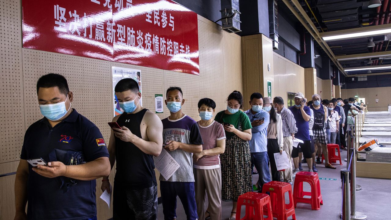 Residents line up at a vaccination site on June 9 in the city of Wuhan, China.