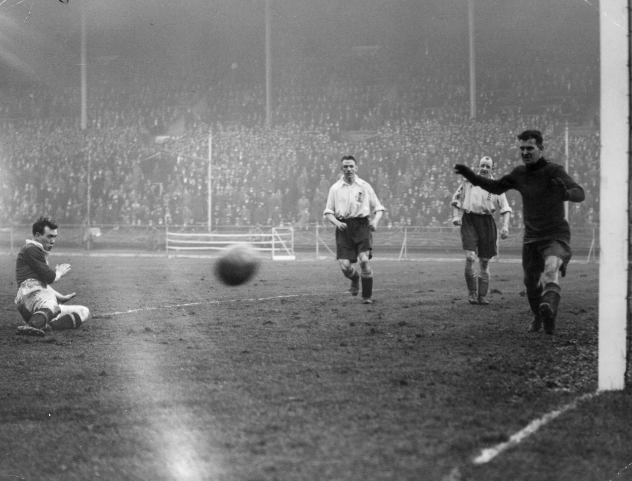 31 March 1928:  Scottish footballer Gallacher shoots during a match between England and Scotland. The team was captained by Jimmy McMullan and the Scots won 5-0. 