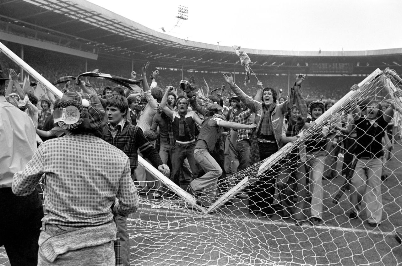 June 4 1977: Jubilant Scotland fans demolish the Wembley goalposts after seeing their team win 2-1. 