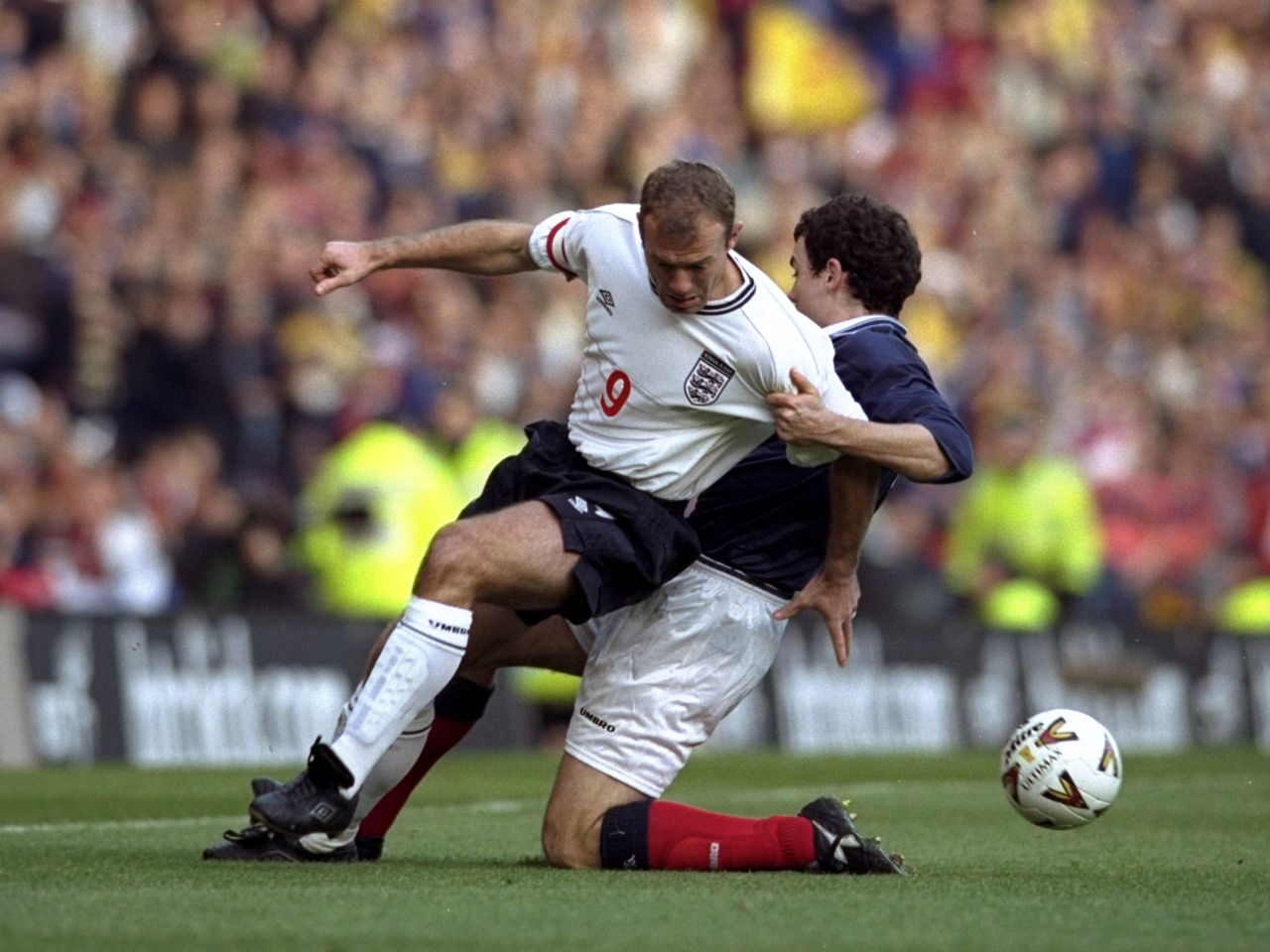 November 13 1999:  Alan Shearer is closely marked by Scotland's Christian Dailly during the Euro 2000 play-off first leg match at Hampden Park. England won 2-0.