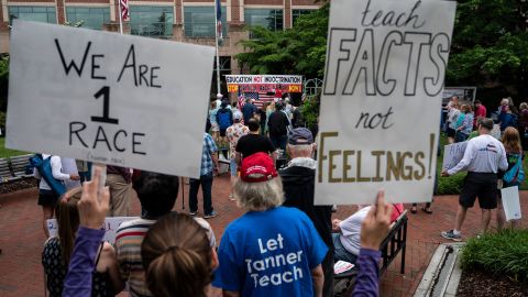 People attend a rally against critical race theory being taught in schools at the Loudoun County Government Center in Leesburg, Virginia on Saturday, June 12. 