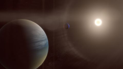 In this artist's illustration, two gaseous exoplanets can be seen orbiting the bright sun-like star HD 152843. 
