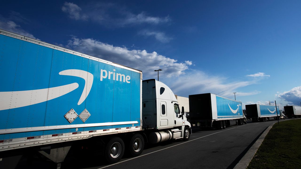 An Amazon tractor trailers line up outside the Amazon Fulfillment Center in the Staten Island borough of New York.  Amazon will hold its annual Prime Day over two days in June this year, the earliest it has ever held the sales event. 