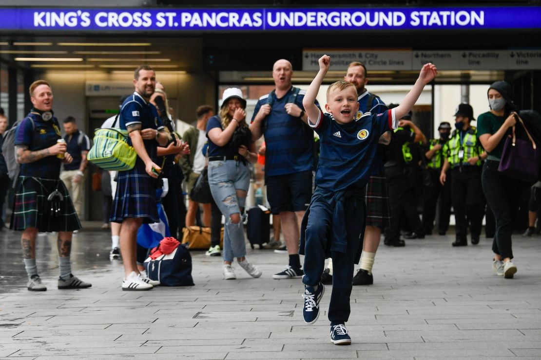Scotland fans arrive at King's Cross St. Pancras, London, ahead of the match with England.