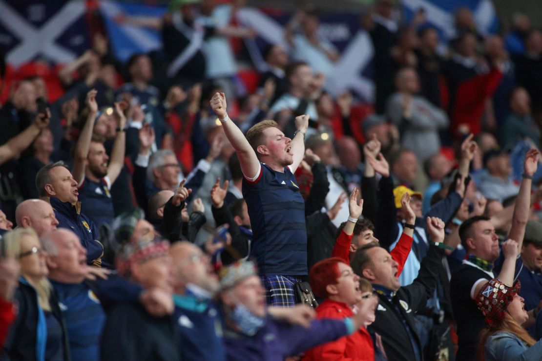 Scotland's supporters sing the national anthem before the start of the match against England.