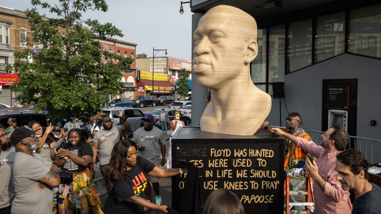 A George Floyd statue by artist Chris Carnabuci was unveiled as part of Juneteenth celebrations.