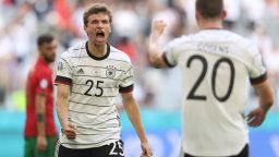 MUNICH, GERMANY - JUNE 19: Thomas Mueller of Germany celebrates their side's third goal scored by team mates Kai Havertz (not pictured) during the UEFA Euro 2020 Championship Group F match between Portugal and Germany at Football Arena Munich on June 19, 2021 in Munich, Germany. (Photo by Alexander Hassenstein/Getty Images)