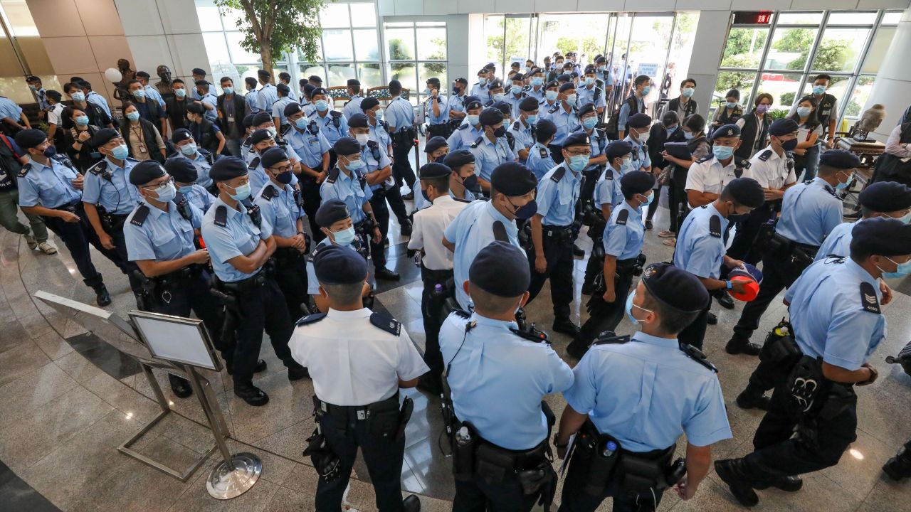 Police officers raid the Apple Daily office on June 17 in Hong Kong.