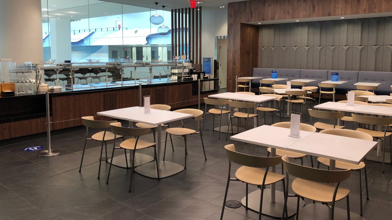 There are plenty of seats in the dining area near the buffet.