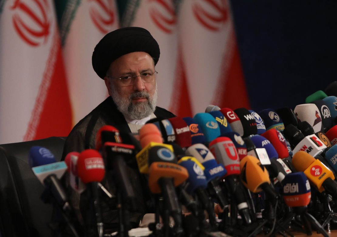 Iran's new President-elect Ebrahim Raisi speaks during a news conference in Tehran, Iran, on Monday. 