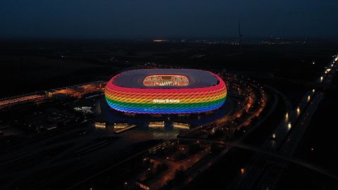The Allianz Arena in Munich is illuminated in rainbow colors during the Bundesliga match between Bayern Munich and Hoffenheim on January 30, 2021.