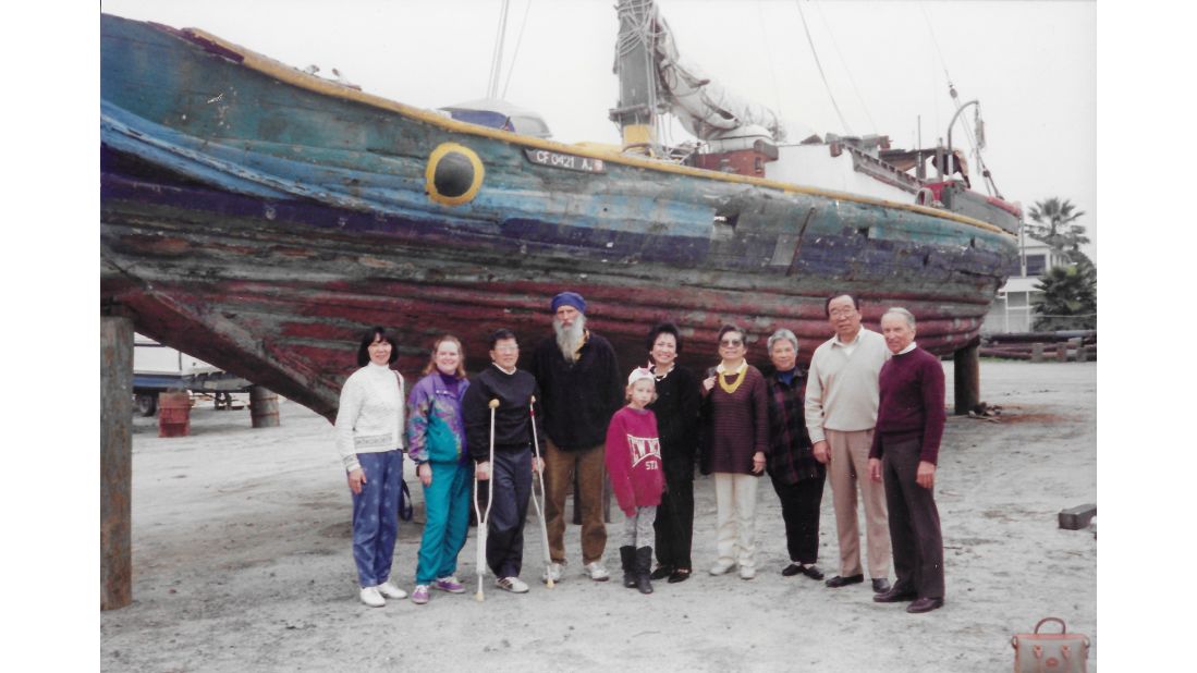 <strong>A new home: </strong>About 50 years after Free China's journey, Dione Chen -- Reno Chen's daughter -- decided to look for the junk boat. Her family took a picture with the last owner of the junk, a man named Govinda, as well as his daughter, who Chen says was born on the ship.