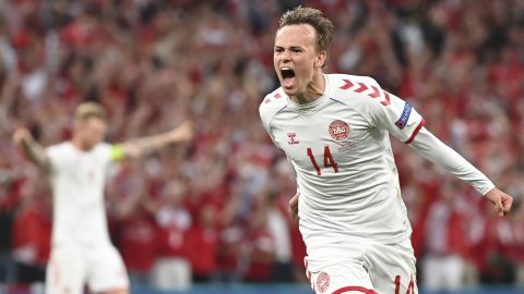 Denmark's Mikkel Damsgaard celebrates after scoring his side's opening goal against Russia.