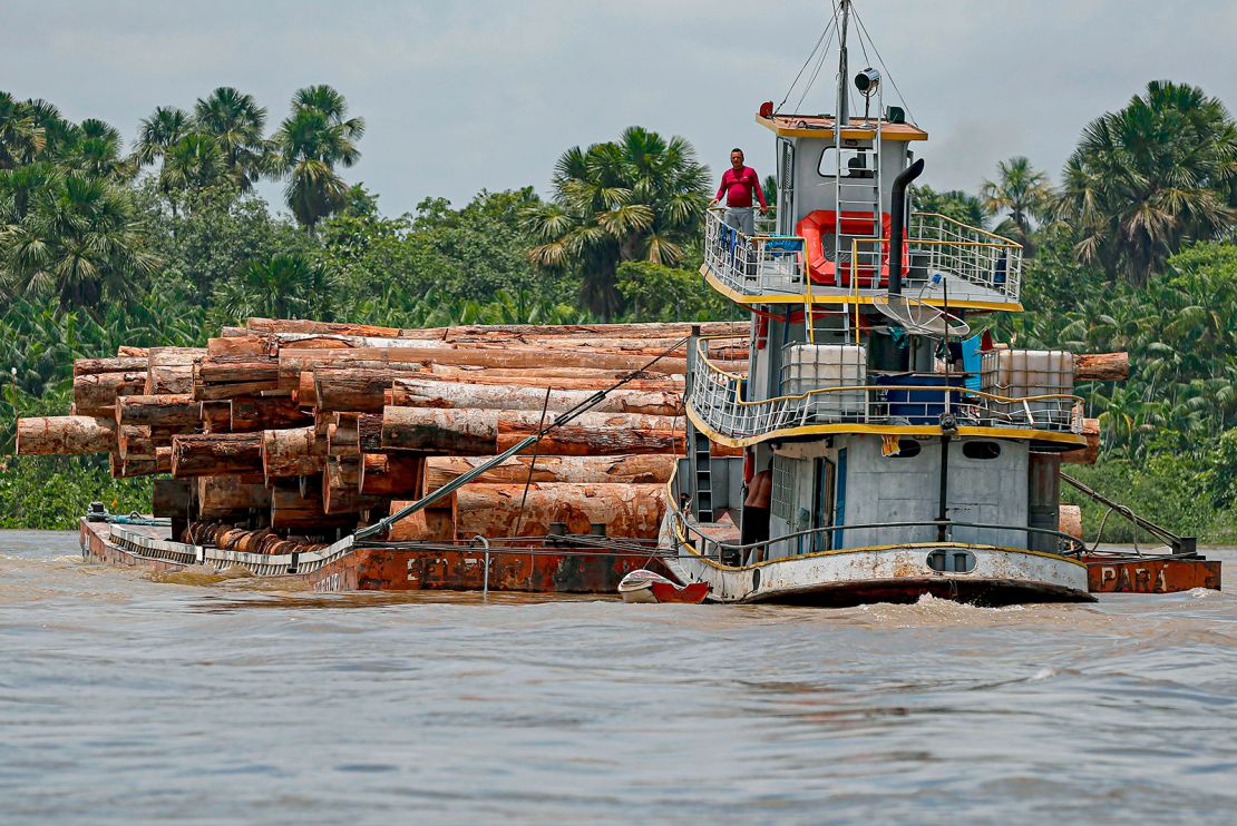 A vessel transports logs on a raft along the Murutipucu River in the municipality of Igarape-Miri in the region of Baixo Tocantins, northeast of Para, Brazil, on September 18, 2020.
