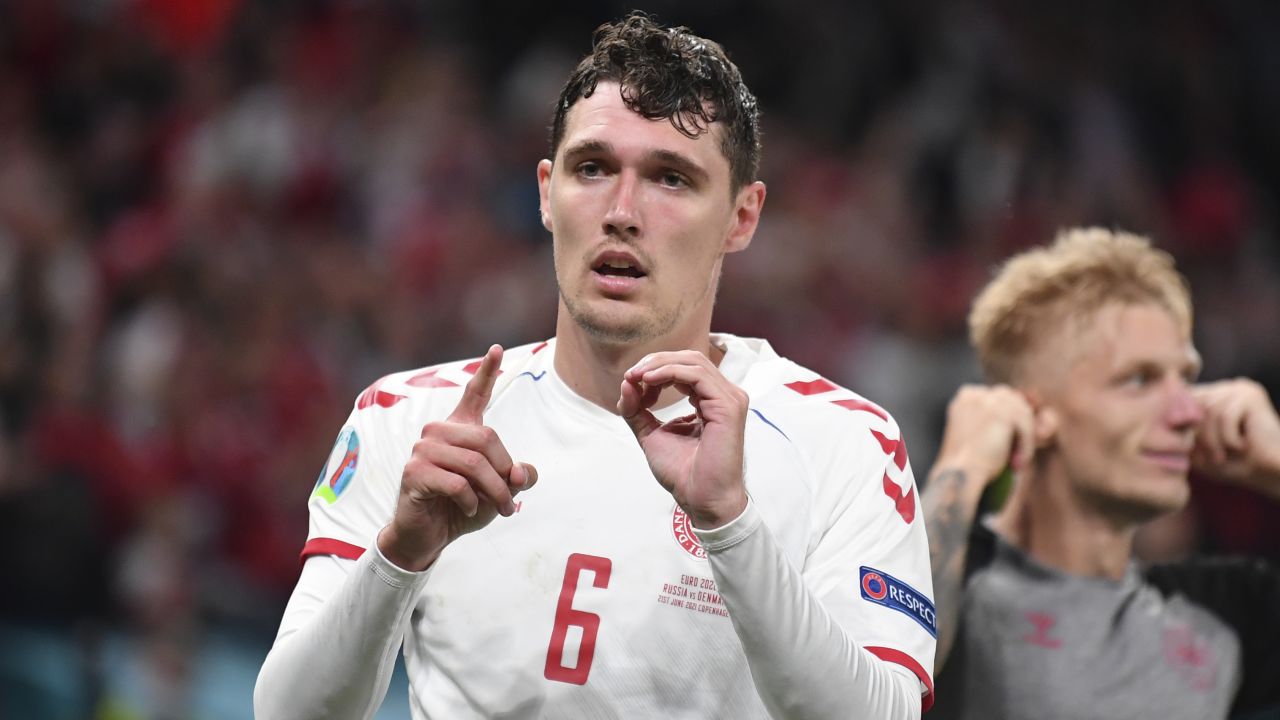 Denmark's Andreas Christensen honors Christian Eriksen after scoring his side's third goal.