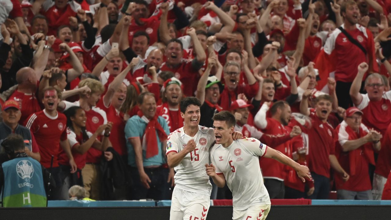 Denmark's Joakim Maehle celebrates after scoring his side's fourth goal against Russia.
