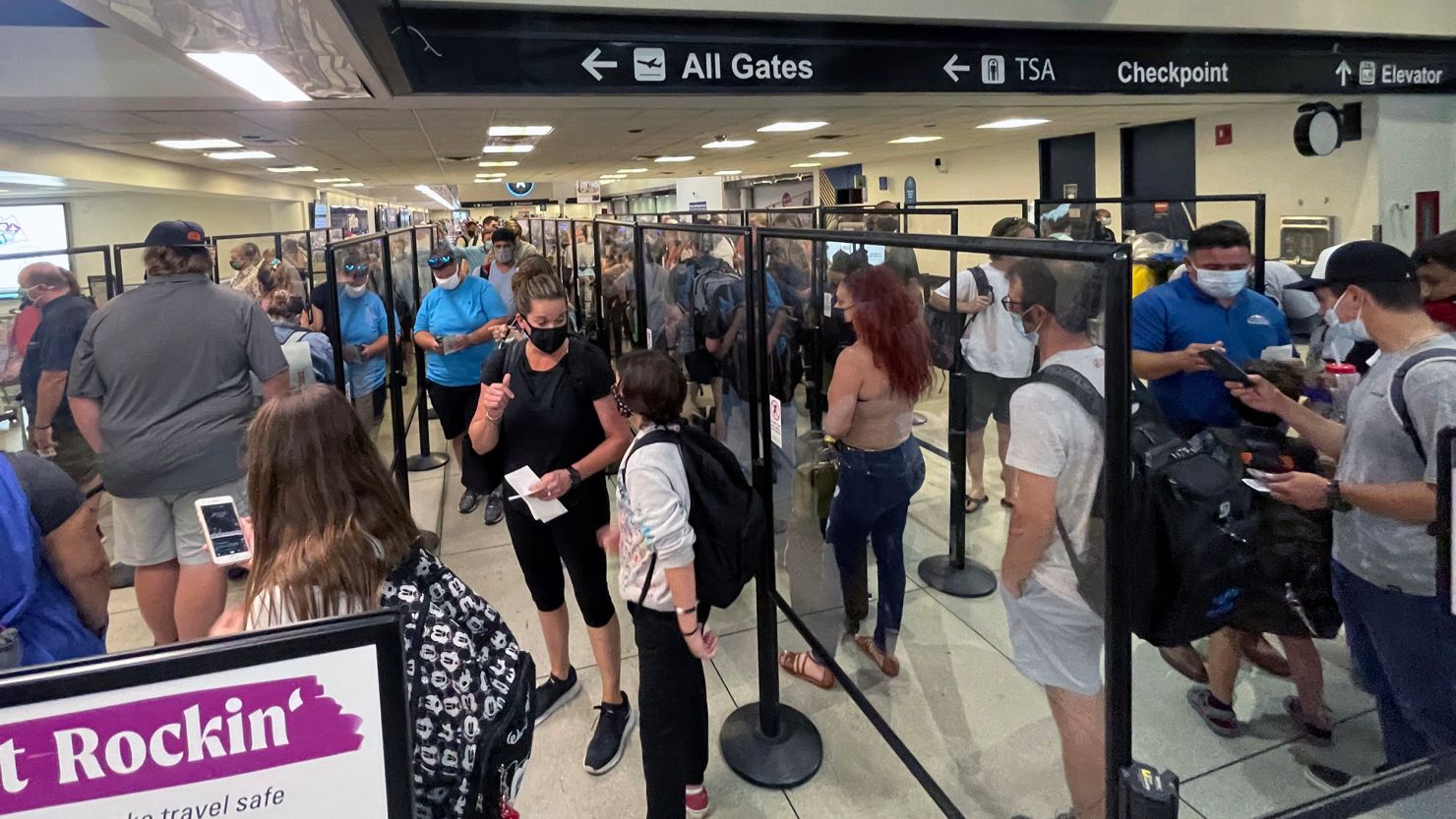 CHARLOTTE, NC - JUNE 20: American Airlines customers seen stranded at Charlotte Airport after American Airlines cut 1 percent of its flights to alleviate pressure on operations due to labor shortage and increased travel on June 20, 2021 in Charlotte, North Carolina. Credit: mpi34/MediaPunch /IPX