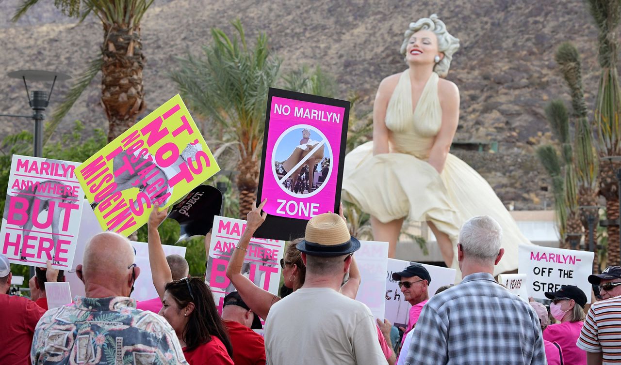 Protesters gather at the "Forever Marilyn" statue by Seward Johnson in Palm Springs.