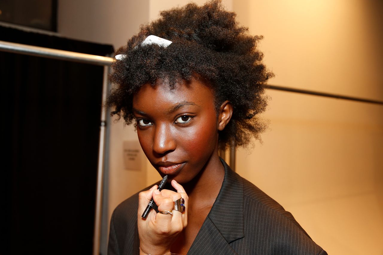A model backstage at a Christopher John Rogers show during New York Fashion Week in 2019.