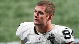 FILE - In this Nov. 29, 2020, file photo, Las Vegas Raiders defensive end Carl Nassib leaves the field after an NFL football game against the Atlanta Falcons in Atlanta. Nassib on Monday, June 21, 2021, became the first active NFL player to come out as gay. Nassib announced the news on Instagram, saying he was not doing it for the attention but because "I just think that representation and visibility are so important." (AP Photo/John Bazemore, File)