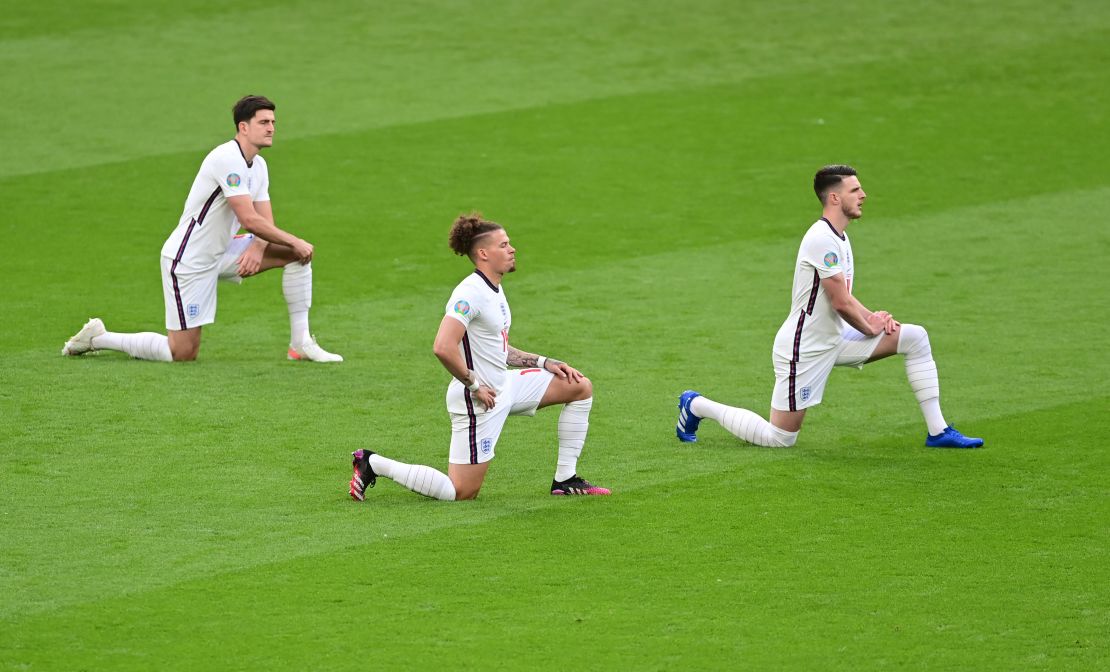 England's Harry Maguire, Kalvin Phillips and Declan Rice take a knee ahead of Tuesday's match. 