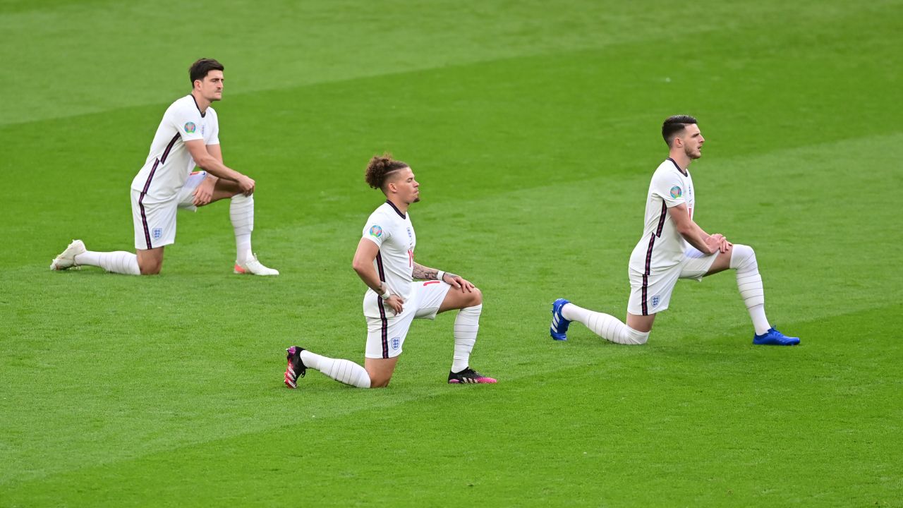 England's Harry Maguire, Kalvin Phillips and Declan Rice take a knee ahead of Tuesday's match. 