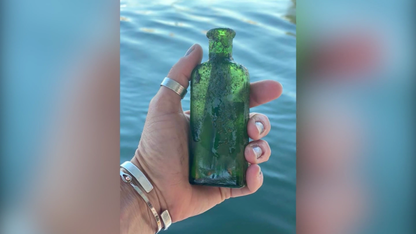 A boat captain found a 95-year-old message in a bottle in Michigan. The  internet helped track down the writer's daughter