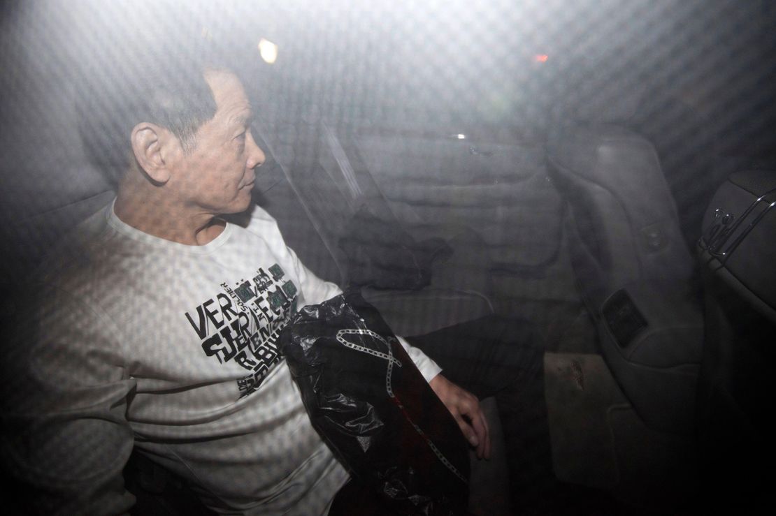 Former triad leader Wan Kuok-koi leaves in a car after his release from prison in Macao in 2012.