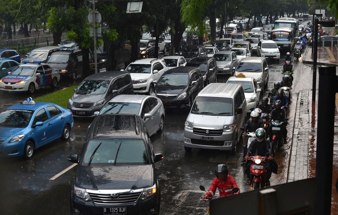 Commuters jostle for space in Jakarta's notorious traffic on April 25, 2013.