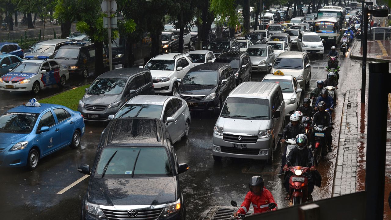 Commuters jostle for space in Jakarta's notorious traffic on April 25, 2013.