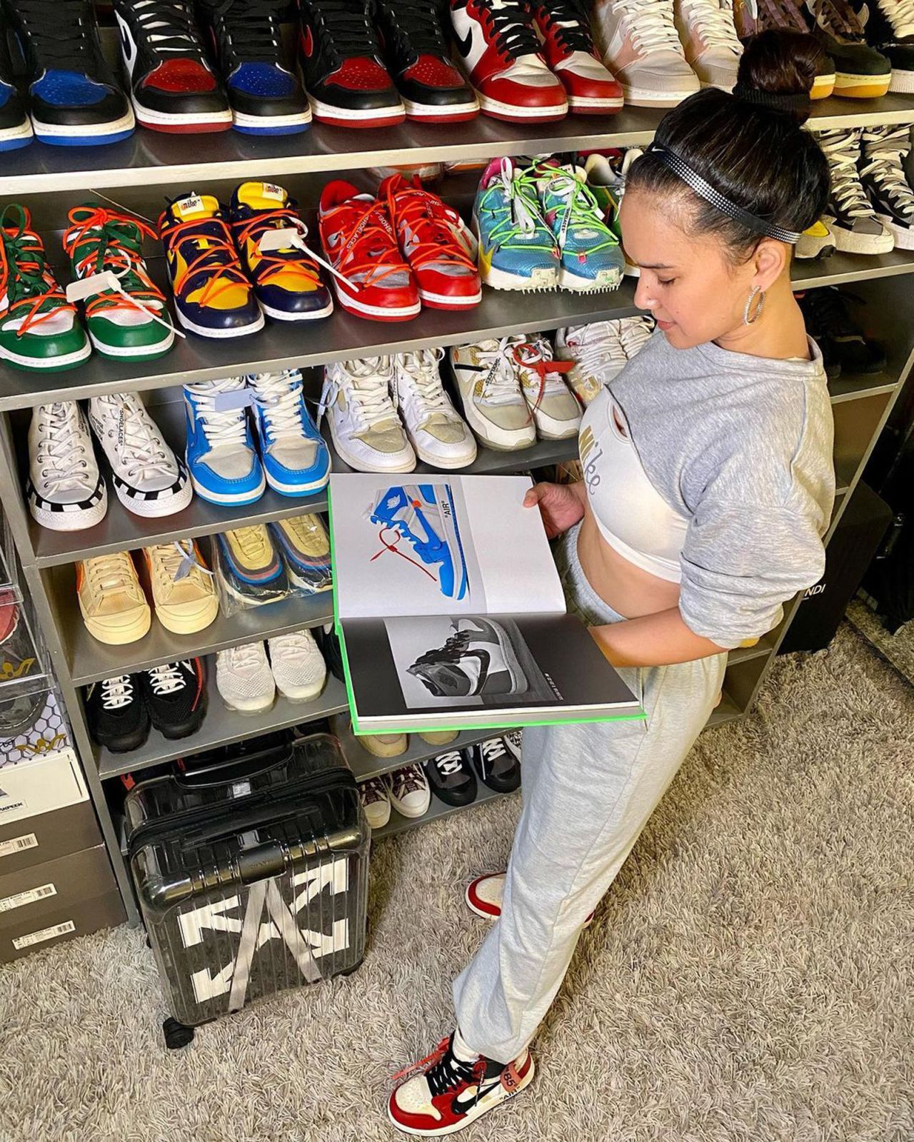 Collector Ann Jacobe with some of the sneakers in her closet. 