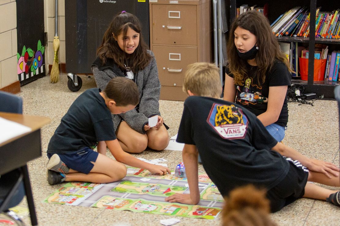 Fifth-graders program a Bee-Bot during a summer school class on June 14 at Goliad Elementary School in Odessa, Texas.