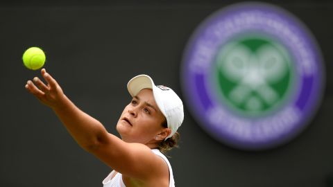 Barty serves in her ladies' singles first round match against Saisai Zheng during Wimbledon in 2019.