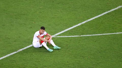 Mert Muldur looks dejected following the defeat to Switzerland.