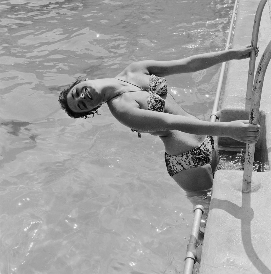 Collins, seen in London in 1955, briefly followed in her sister's footsteps and dabbled in acting, although her first love was always the written word. Despite not being encouraged to pursue writing as a career, <a href="index.php?page=&url=https%3A%2F%2Fwww.latimes.com%2Farchives%2Fla-xpm-1985-08-25-ca-24718-story.html" target="_blank" target="_blank">Collins said in the LA Times interview</a> that she "always, somewhere in the back of my head, knew I would write."